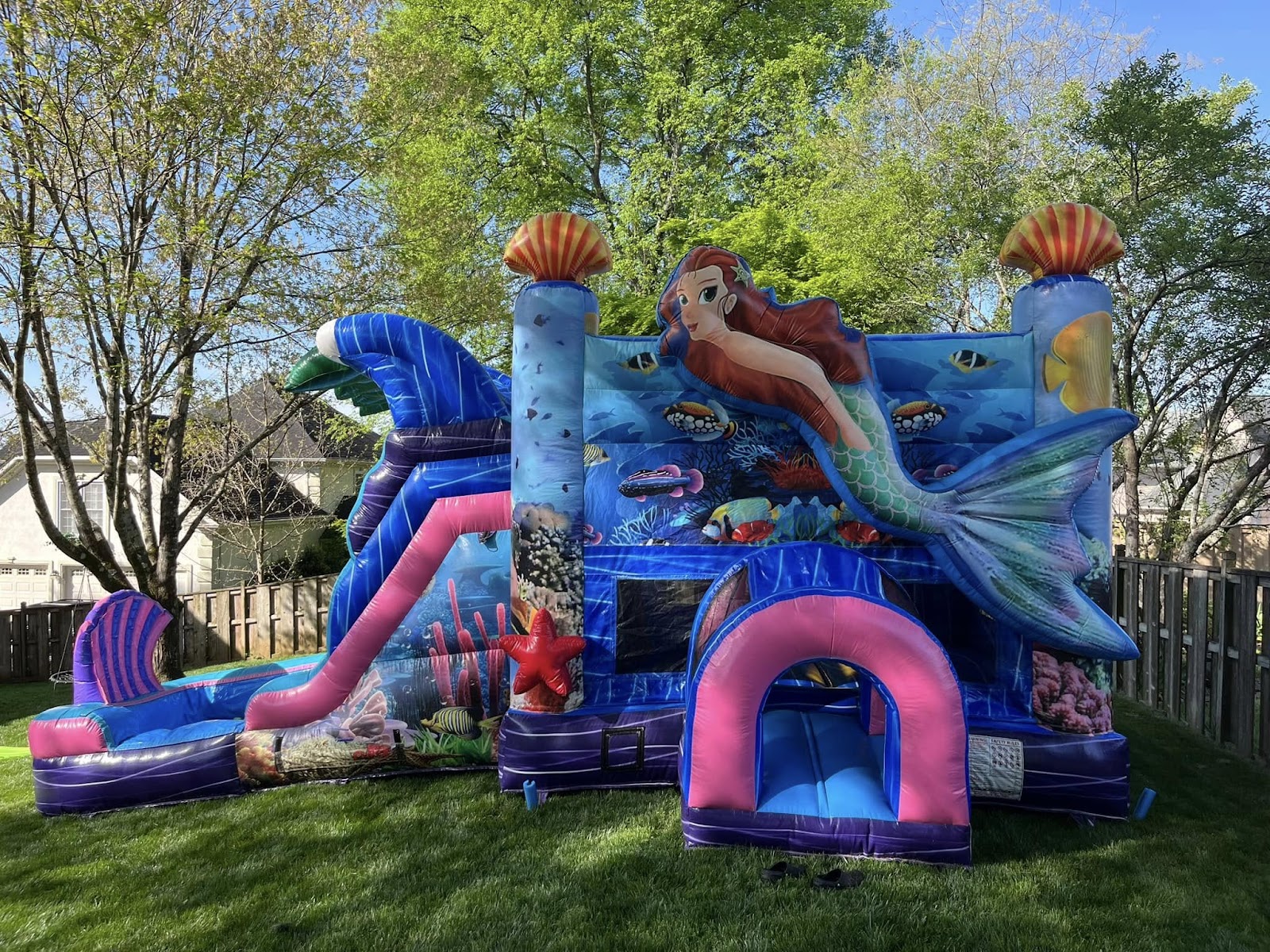 Kids having an absolute blast at a Knoxville bounce house party